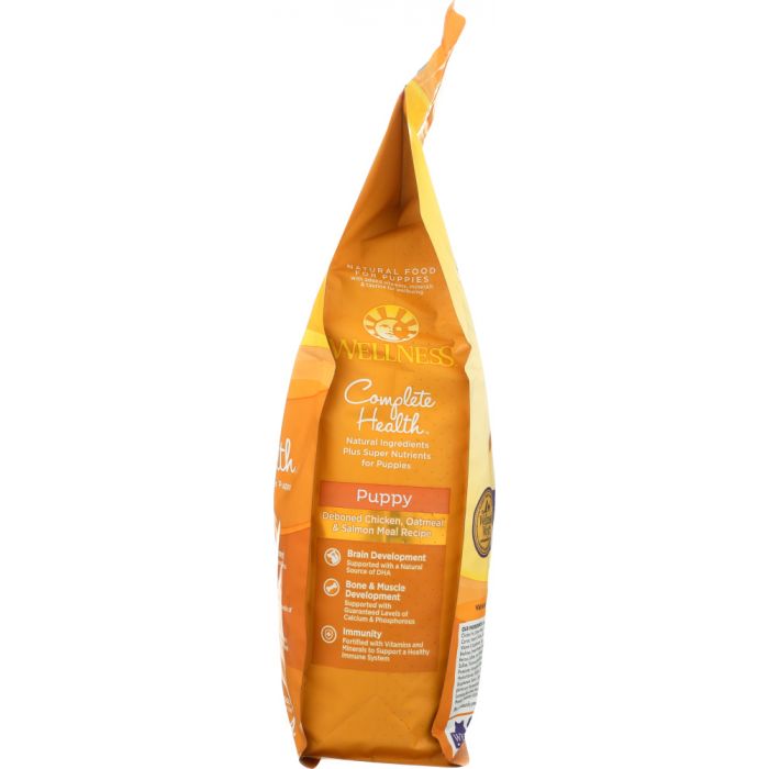 Side photo of Wellness Chicken Salmon and Oatmeal Natural Dry Puppy Food